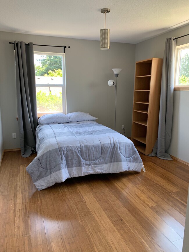 Main bedroom with lots of light. - 6122 SE 45th Ave.