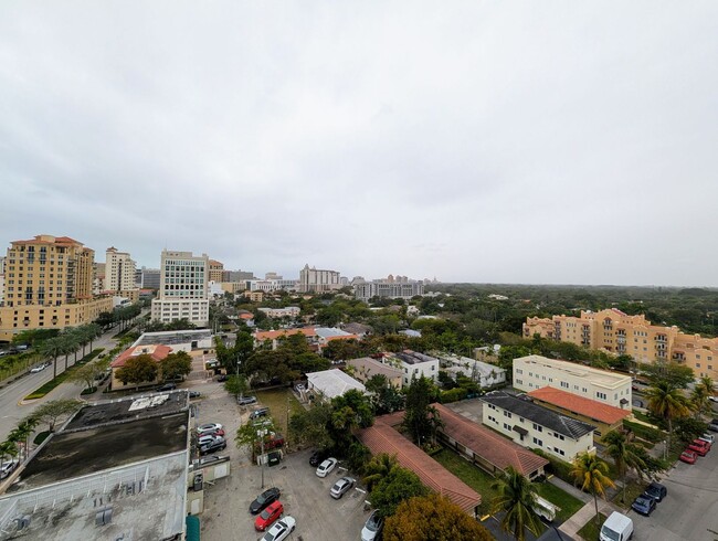 Building Photo - Modern 1BR/1BA Condo with 2 Parking Spaces – Prime Coral Gables Location