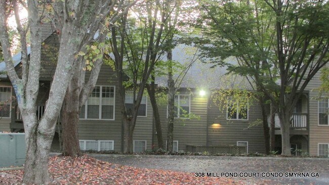 Building Photo - ENJOY THIS BEAUTIFUL CONDO NESTLED IN THE ...