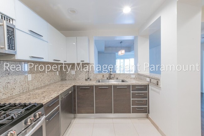 Building Photo - me 3-Bedroom Condo for Rent – Spacious, Mo...