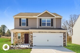 Building Photo - 609 Howling Wind Dr