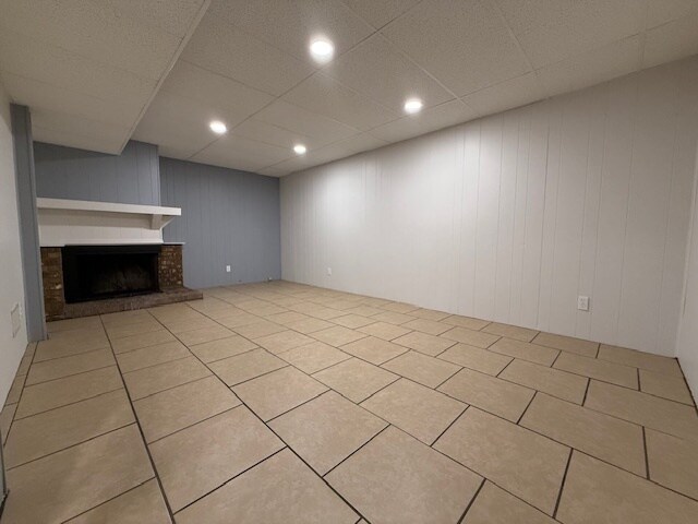 Basement Recreation room with wood fireplace - 7468 Graystone Ct