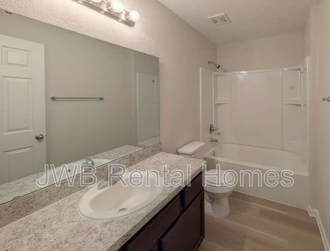 Building Photo - 7876 Playschool Ln