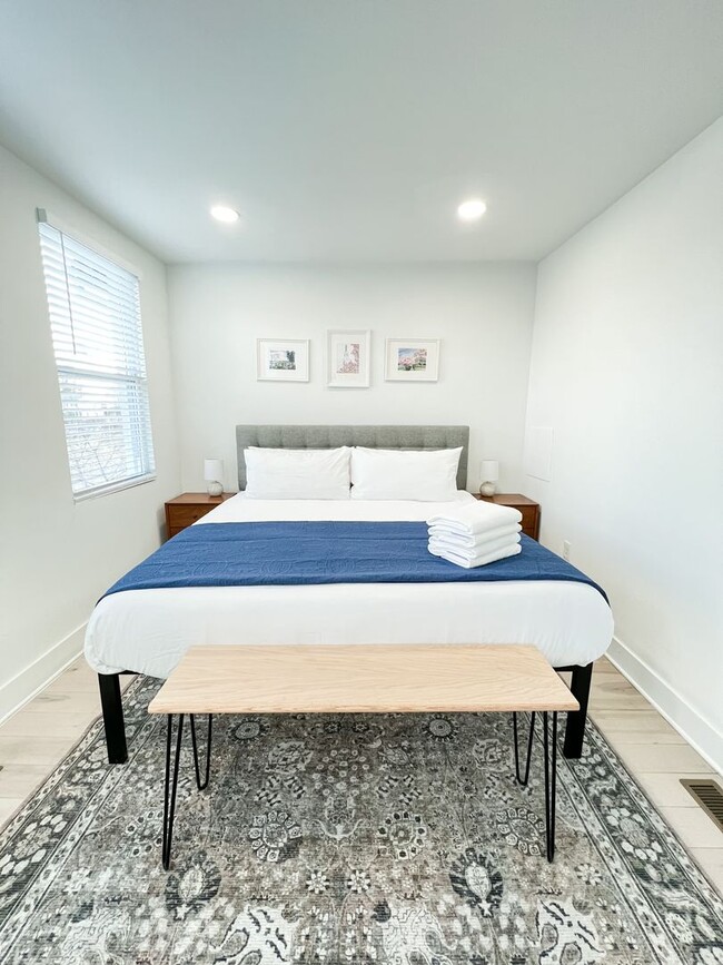 Building Photo - RENOVATED TOWNHOME WITH DECK BY METRO