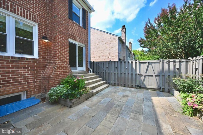 Building Photo - Discover an exquisite opportunity to lease a stunning end-of-row townhouse in the prestigious Bet...