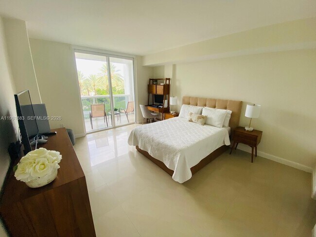 Building Photo - 10275 Collins Ave