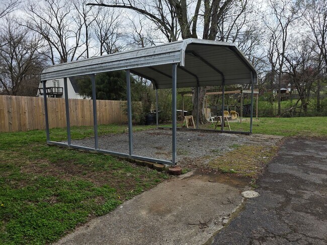 Building Photo - Charming 2BR with Walk-Out Basement, Fenced Yard & Flexible Murphy-Bed Office