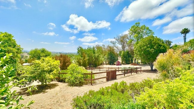 Building Photo - Amazing Location & Sprawling Country Living at its Very Best in this Beautiful Single-Story Home ...