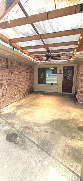 Covered outdoor patio area with lights - 12814 Westhorpe Dr