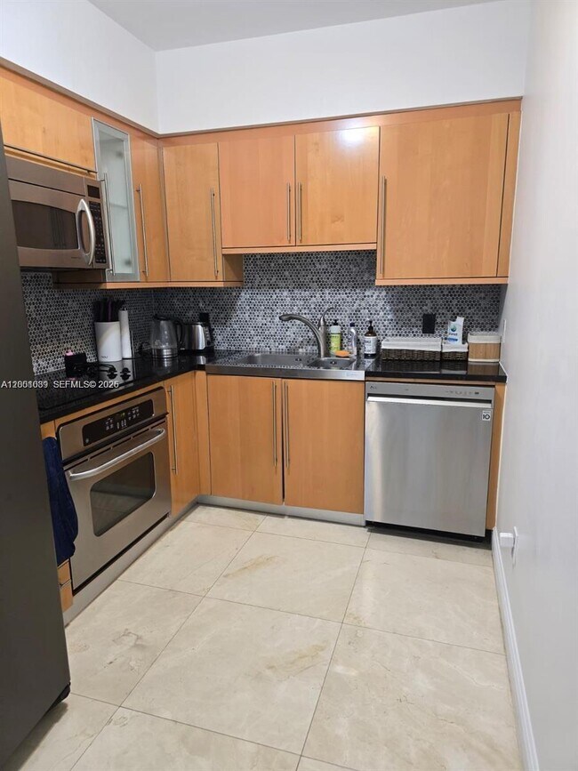 Building Photo - 6365 Collins Ave