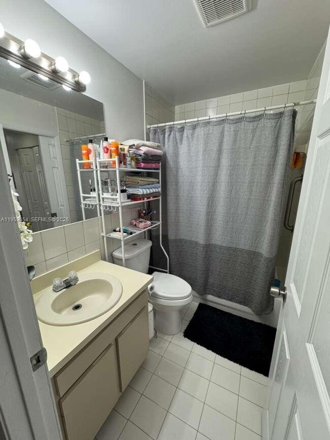 Building Photo - 5083 W 12th Ln