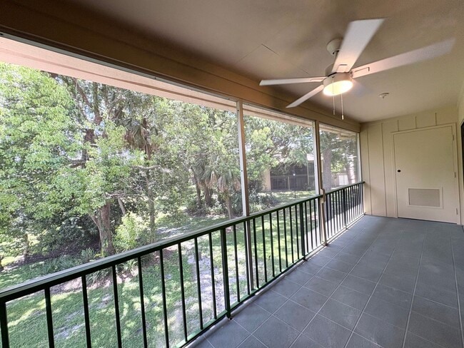 Building Photo - Beautiful Corner Unit with Vinyl Plank Flooring & Private Screened Patio