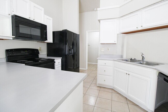 Building Photo - 3223 Tree Grove Dr