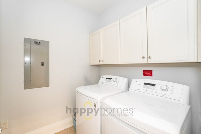 Building Photo - Waterfront Oasis: Fully Furnished 1BR/1.5BA with Marsh Views