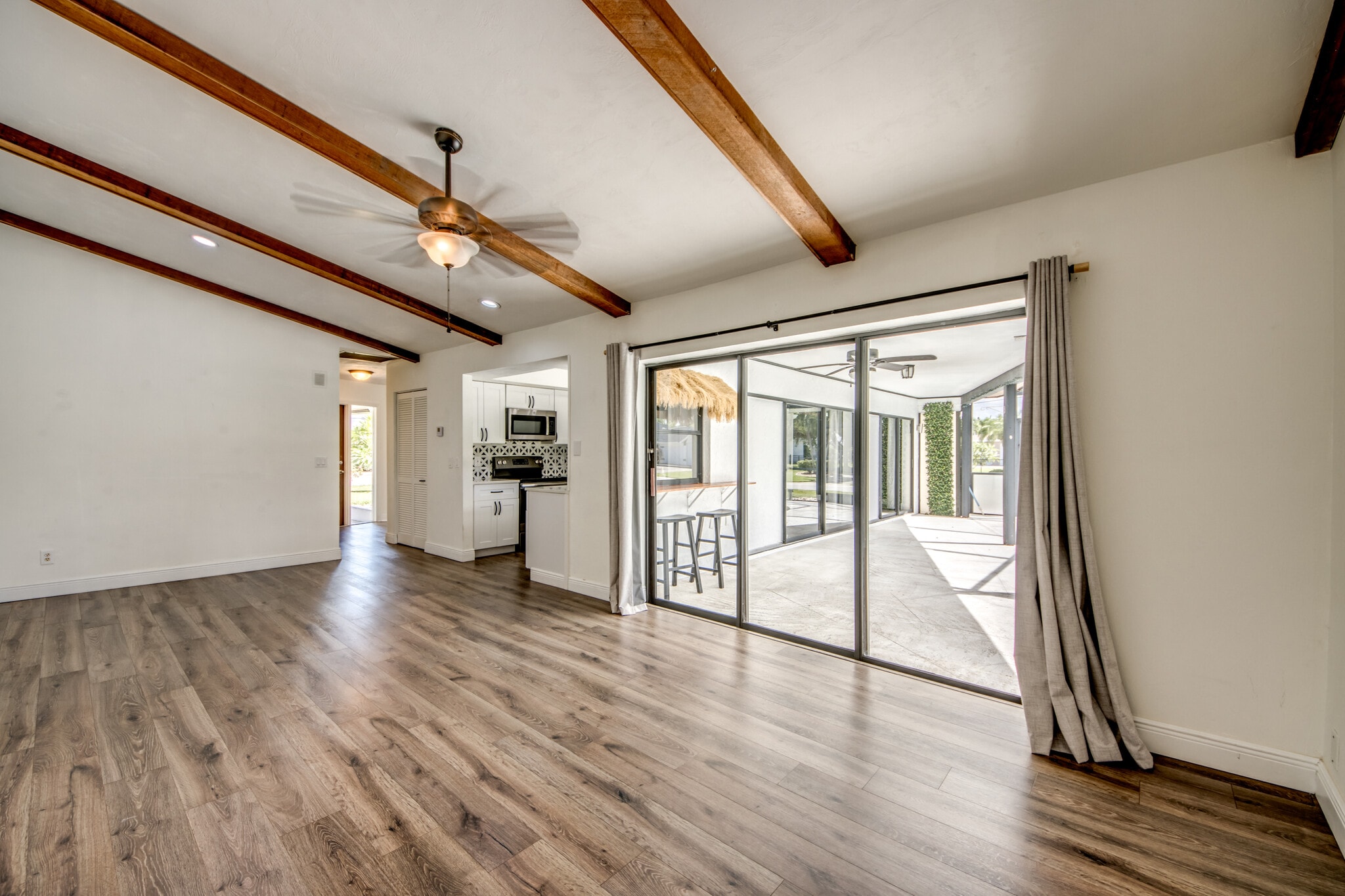Kitchen access is between the great room and the family room and all of them overlook the pool. - 2316 Everest Pky