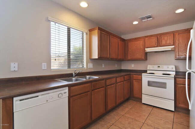 Building Photo - Great-room floor plan with 4 bedrooms PLUS den