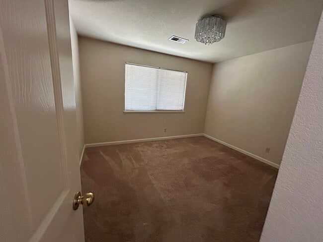 Building Photo - Three Bedroom Two Bath Family Home