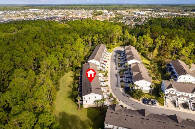 Building Photo - Introducing a captivating 3-story townhome...