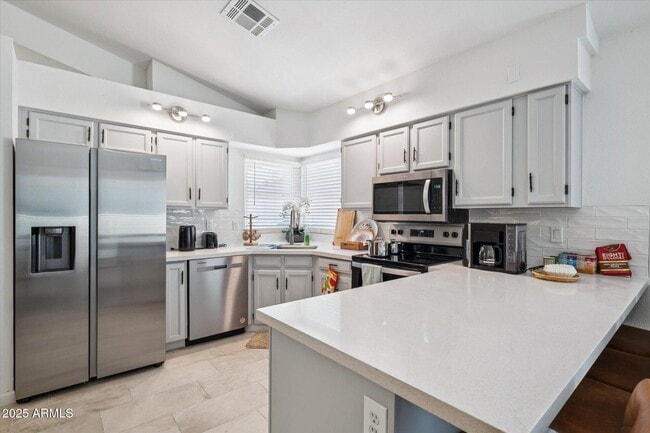 Building Photo - 10821 N 63rd Dr