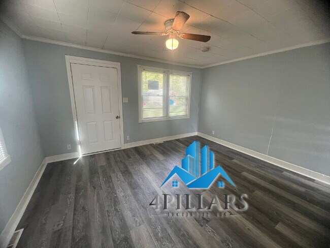 Building Photo - Charming 2 Bedroom Duplex in La Porte with Spacious Layout and Prime Location