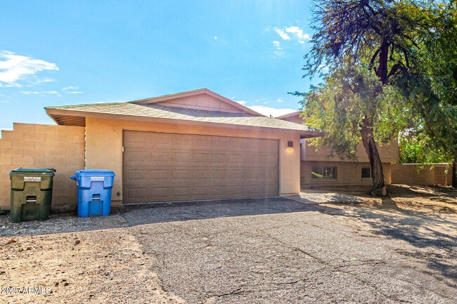 Building Photo - 5031 E Pershing Ave