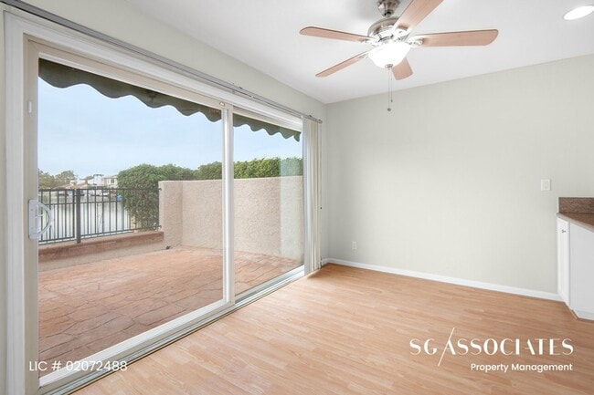 Building Photo - Adorable WATERFRONT Gated Lakeside Villas ...
