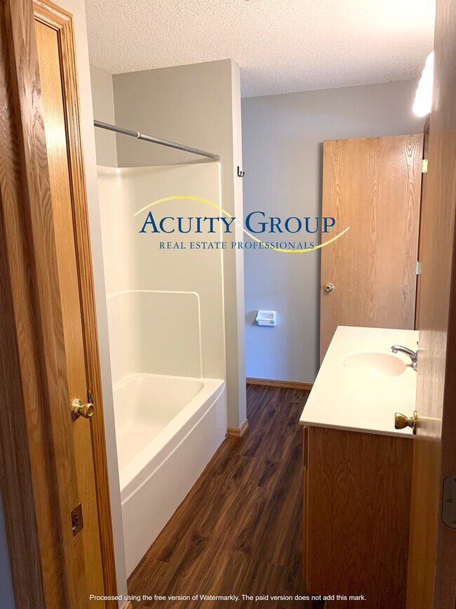 Building Photo - 3BR, 2BA, Champlin Townhome for Move in as soon as 9/1/2026