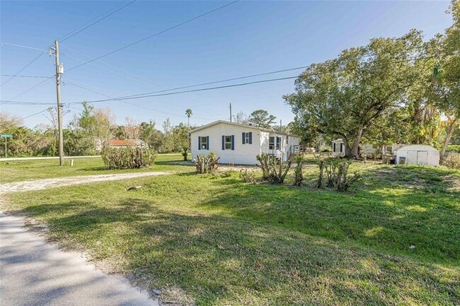 Building Photo - 4960 Tuscaroa Ave