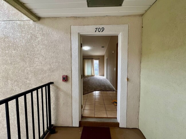 Building Photo - Gated Comfort Condo, Poolside Vibes: Your Next Home Awaits at Merrill Pines