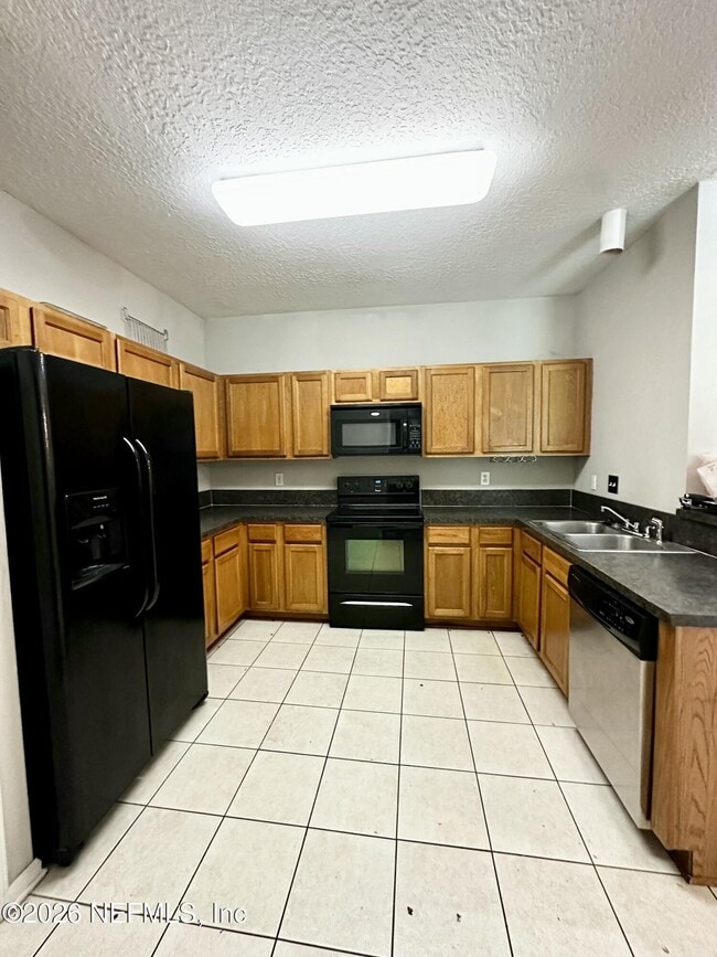 Building Photo - 6985 Ortega Woods Dr