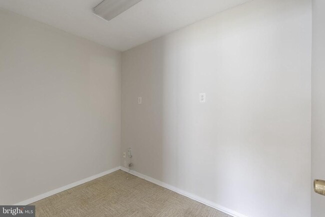 Building Photo - 8005 Woodholme Cir