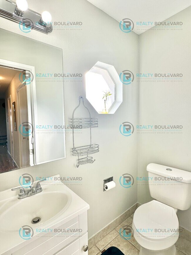 Building Photo - 2-bed, 2-bath, 2-story townhome with pool and park like setting outside the front door.