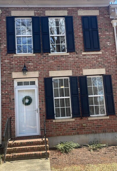 Front view. All brick townhouse. All outside maintenance provided. - 163 Singleton Rd