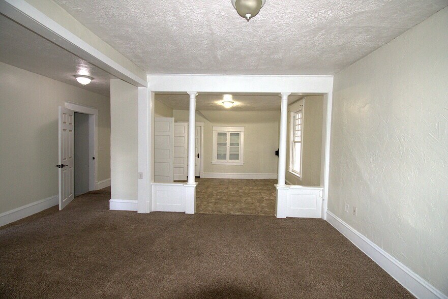 Living Room To Dining Room - 1028 E 8th Ave