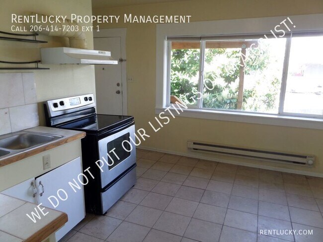 Building Photo - 6523 35th Ave SW