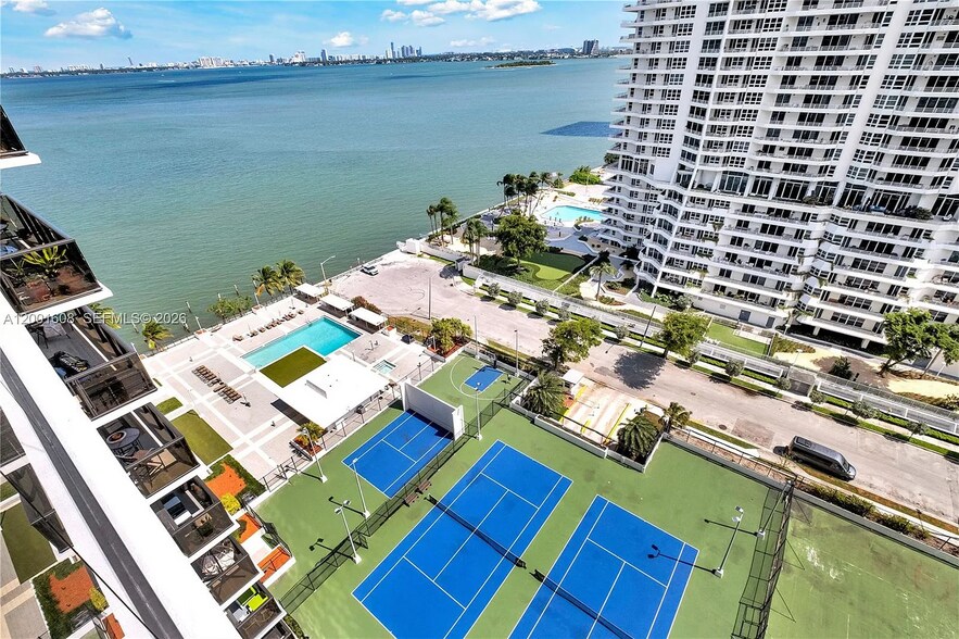 View from Balcony - Pool area - Tennis Courts - Basketball Court - Hot Tub - Outside Club room - 600 NE 36th St