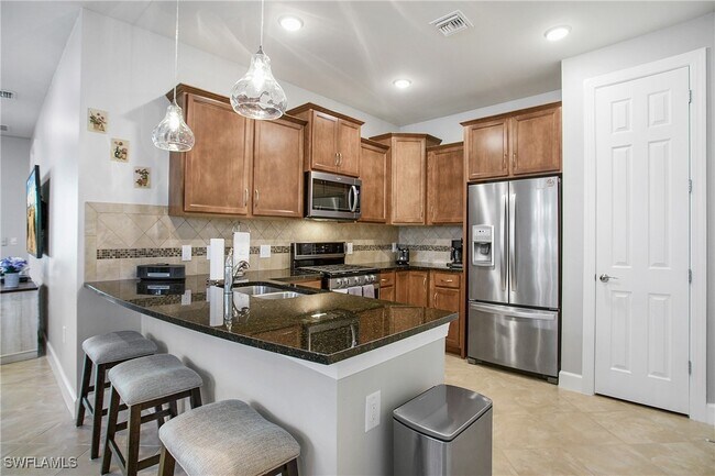 Building Photo - 7674 Jacaranda Ln