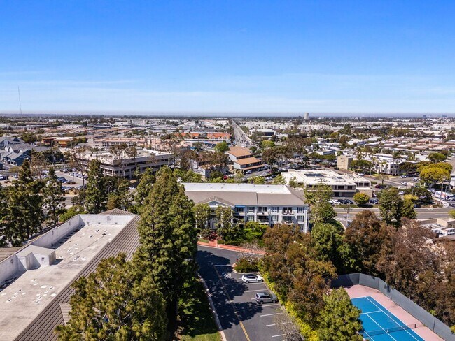 Building Photo - COMING AVAILABLE 4/5/26: Updated Versailles Condo in Newport Beach