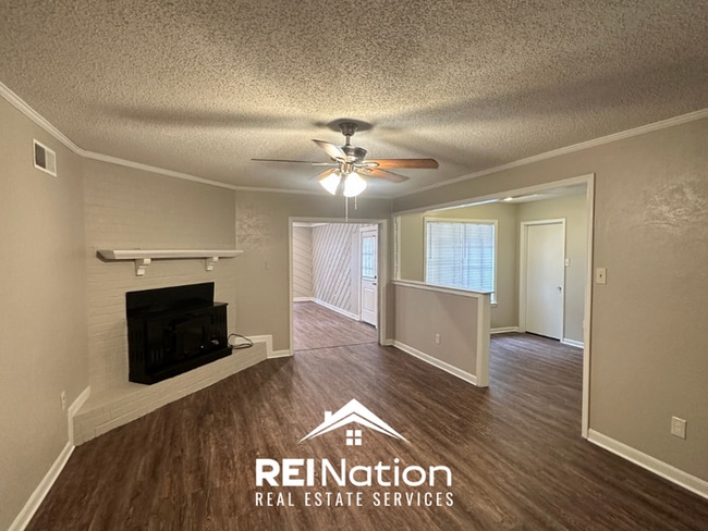 Building Photo - NEWLY RENOVATED! Massive 4BR/2BA Bartlett Stunner | Hardwoods & Fireplace!