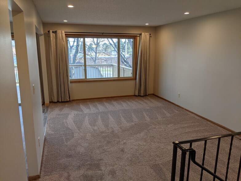Upper Level Living Room - 7644 Woodlawn Dr