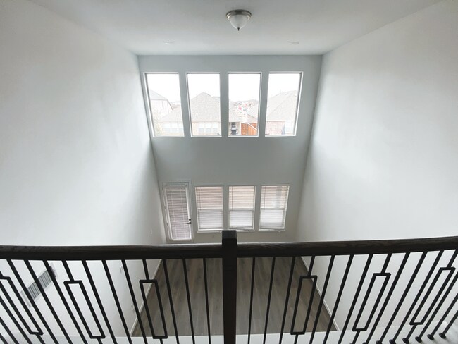 View from Loft - 2 story living room - 621 Hummingbird Dr