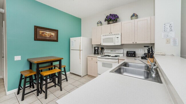 Building Photo - 8114 Princess Palm Ln