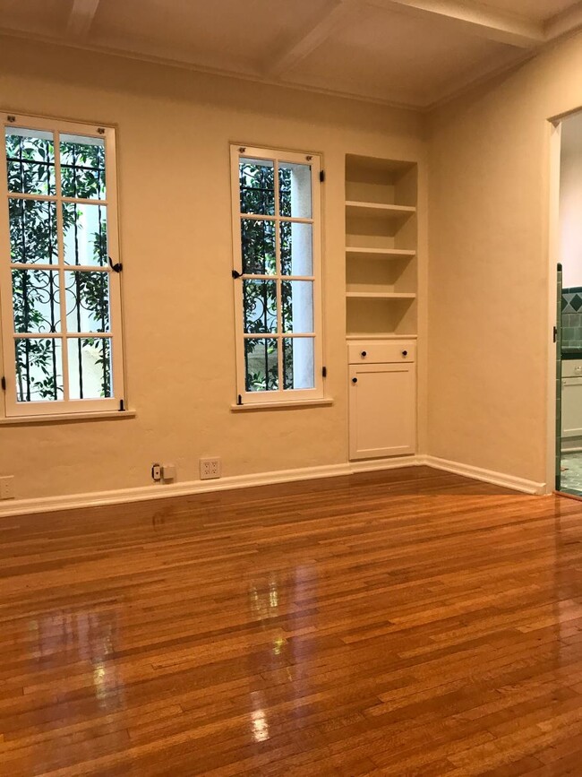 Your 3rd Bedroom w/ Beamed Ceilings, Roman Shades + Lighted Built-Ins - 1103 S Crescent Heights Blvd
