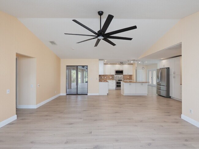 Building Photo - 3 BEDROOM • 2 BATHROOM • PRIVATE POOL • WATERFRONT • BOAT LIFT • ZERO DEPOSIT MOVE-IN AVAILABLE