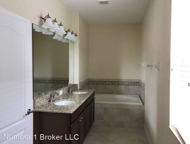 Building Photo - 4 br, 3.5 bath House - 15123 Driftwood Ben...