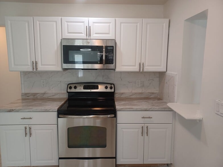 Building Photo - PRICE REDUCED! Newly Remodeled Stunning 4 bedroom / 2 bathroom home with a shed for extra storage...