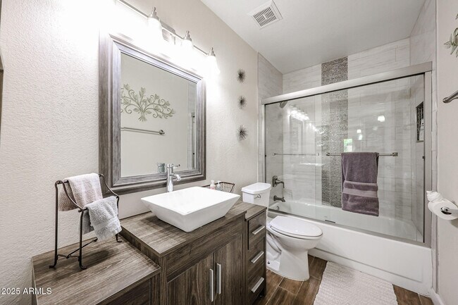 Building Photo - 9085 E Windrose Dr