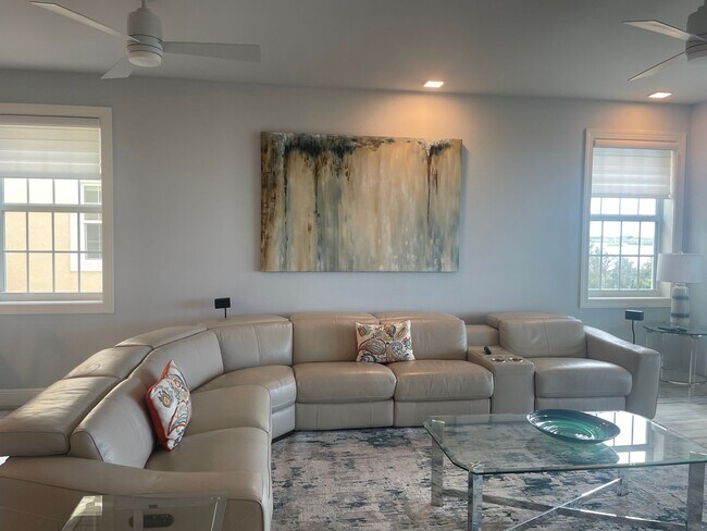 Building Photo - Coastal Luxury at Hidden Bay | 3BR Waterfront Condo with Bay Views