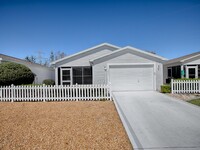 Building Photo - Charming 2BR/2BA Patio Villa in The Villag...