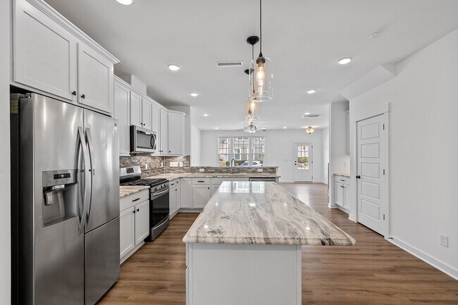 Building Photo - 3 Bedroom Townhome with Rooftop Terrace in Downtown Wake Forest!